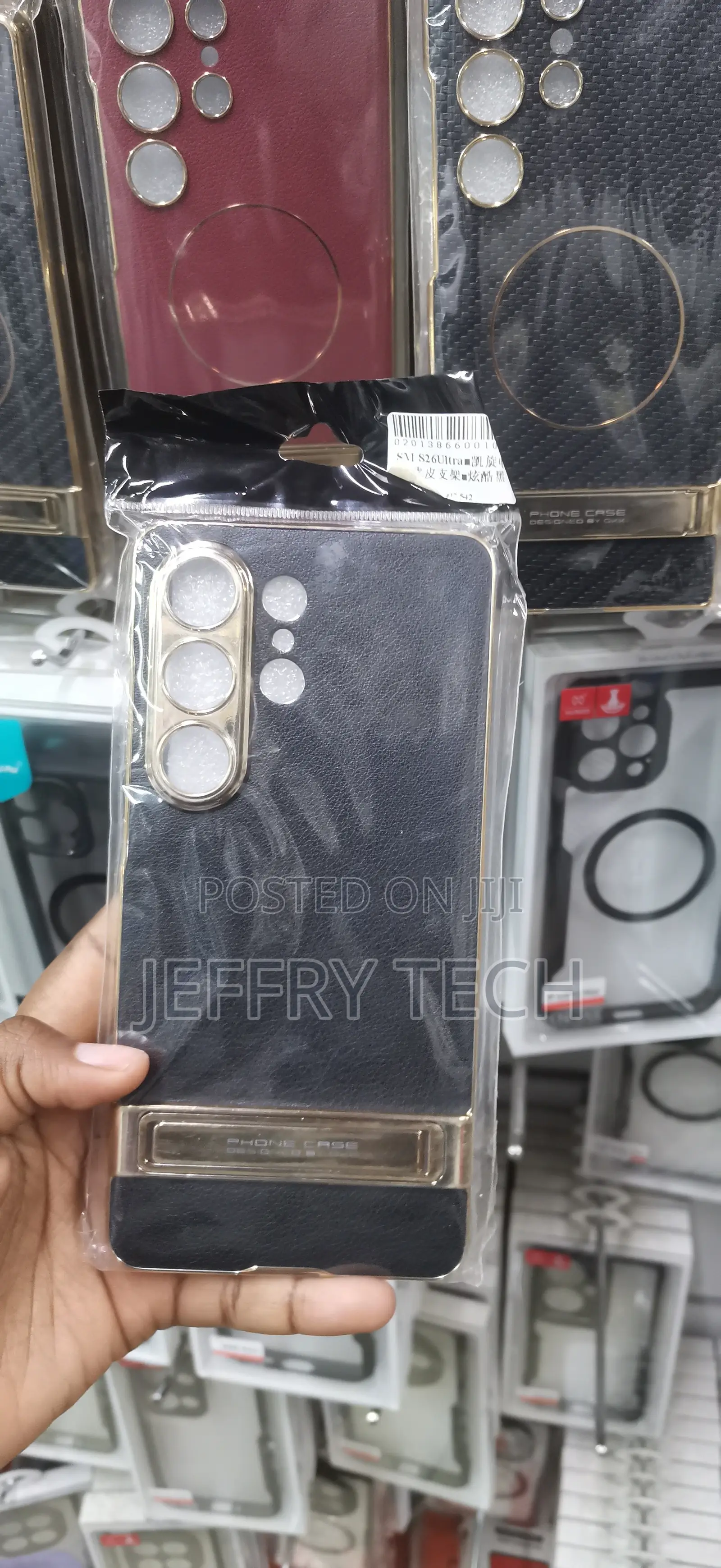 Black Textured Leather Phone Case With an Electroplated Gold Camera