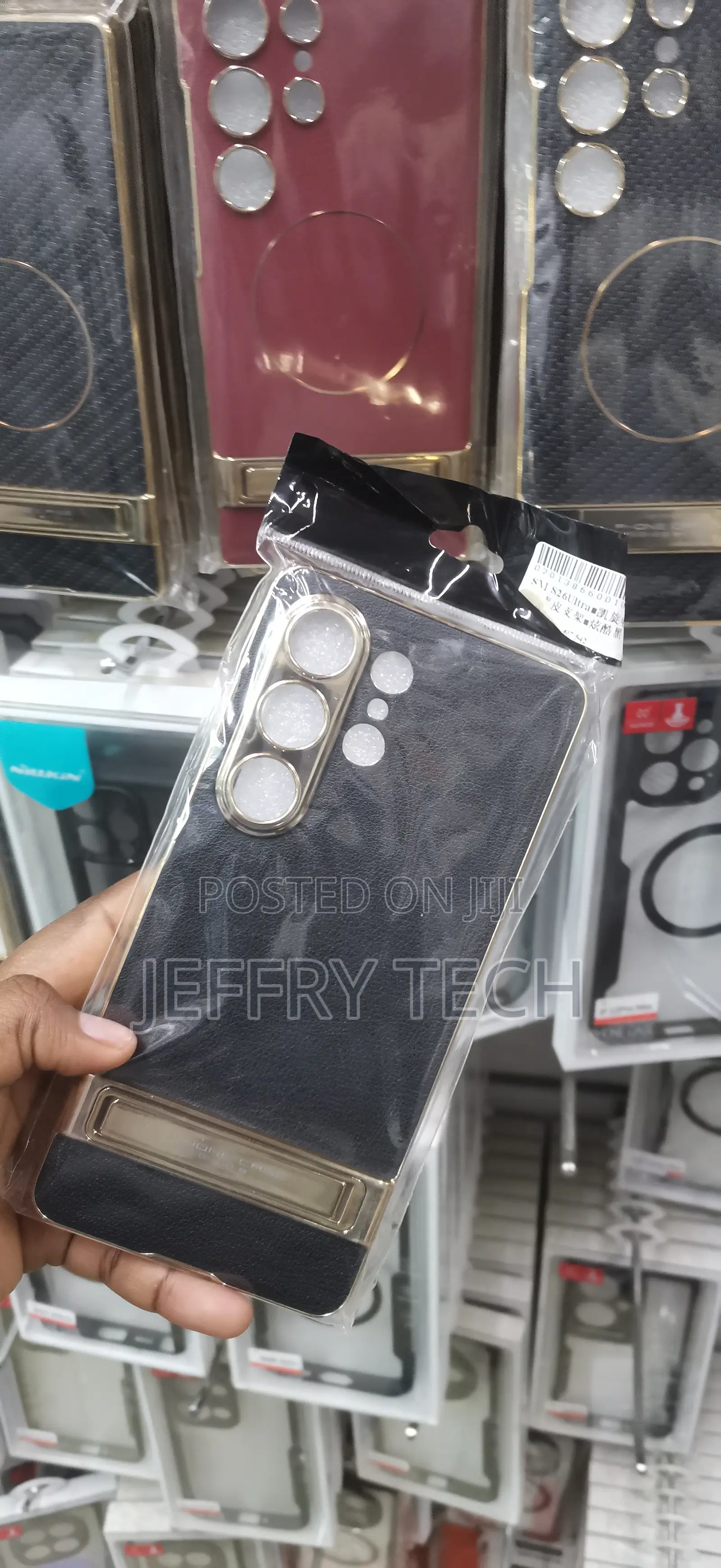 Black Textured Leather Phone Case With an Electroplated Gold Camera