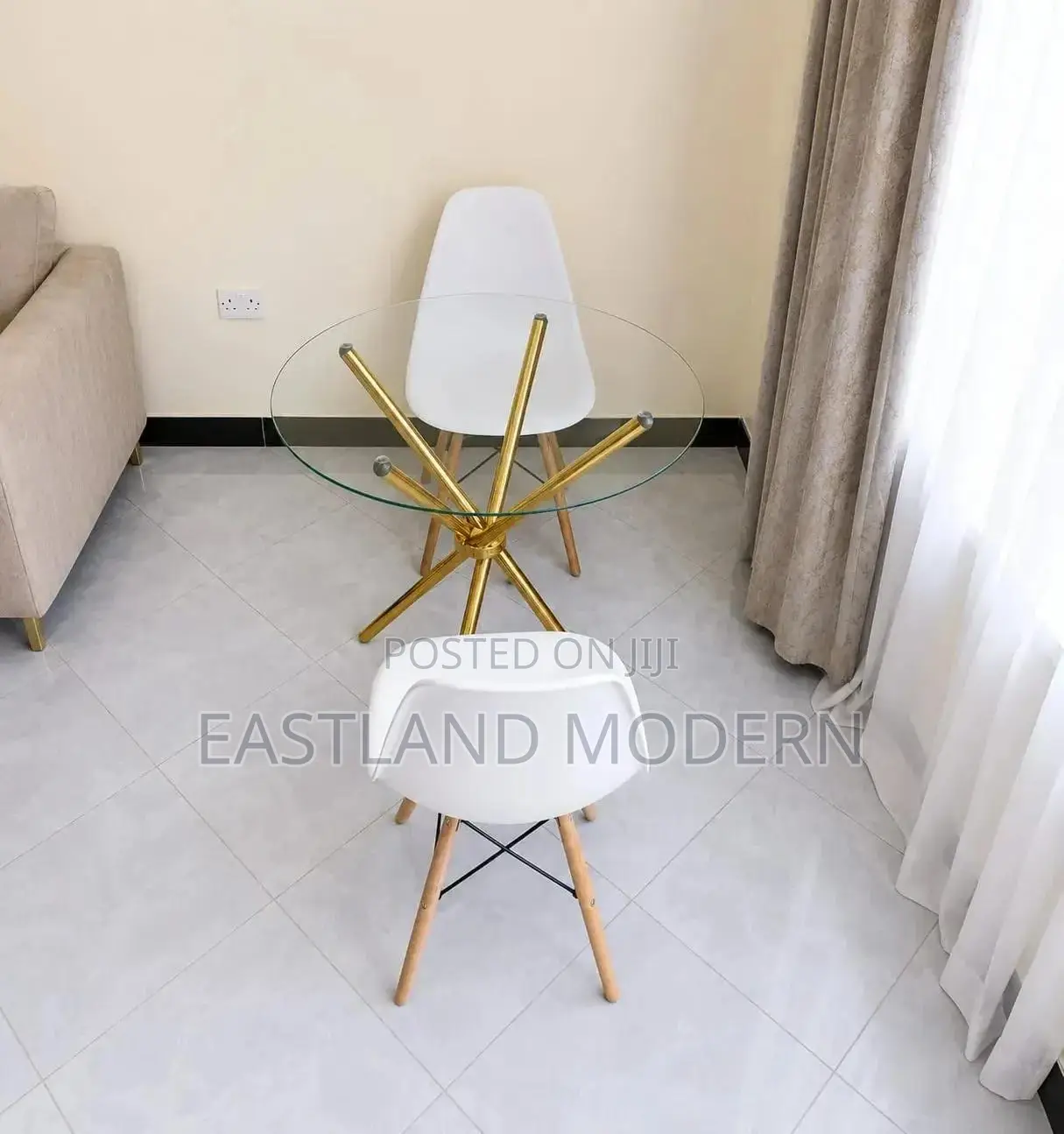 Modern Round Glass Dining Table Set With White Eames Chairs