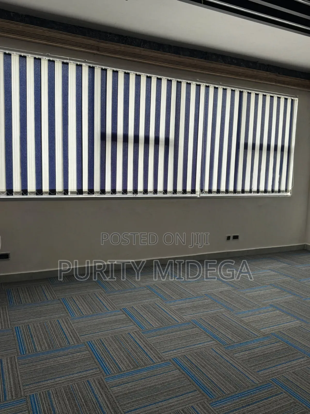 Blinds and Blue Square Shaped Carpet Tiles