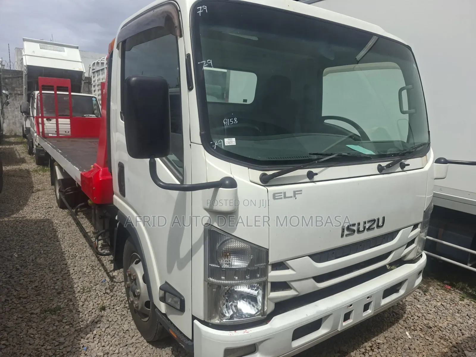 Isuzu Elf Flat Bed Towing Truck