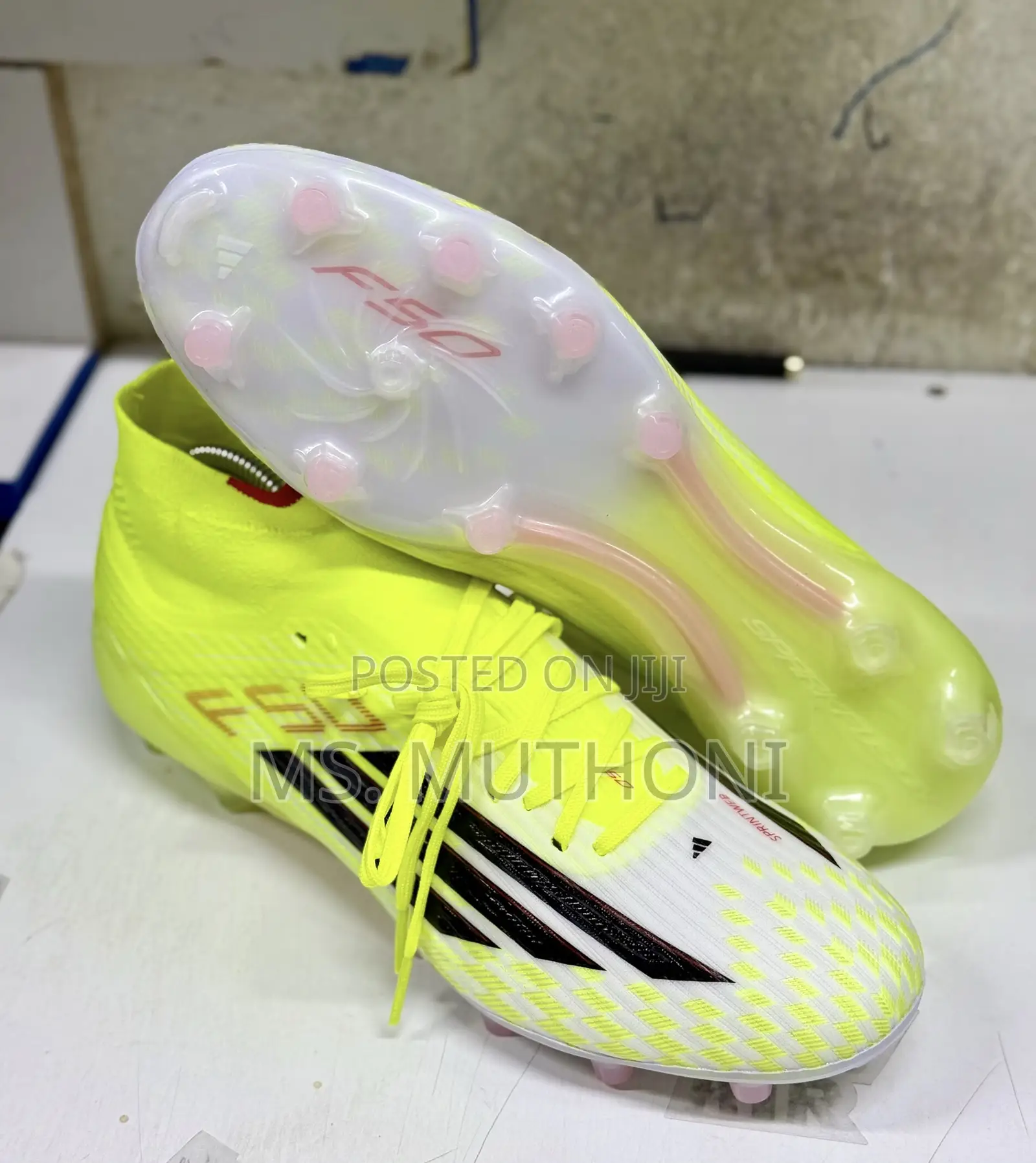 The Adidas F50 League Mid Firm Ground/Multi-Ground Soccer Cleats 40-45