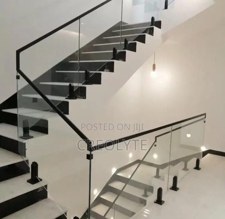 Frameless Glass Balustrade With Steel Handrail – Floating Staircase