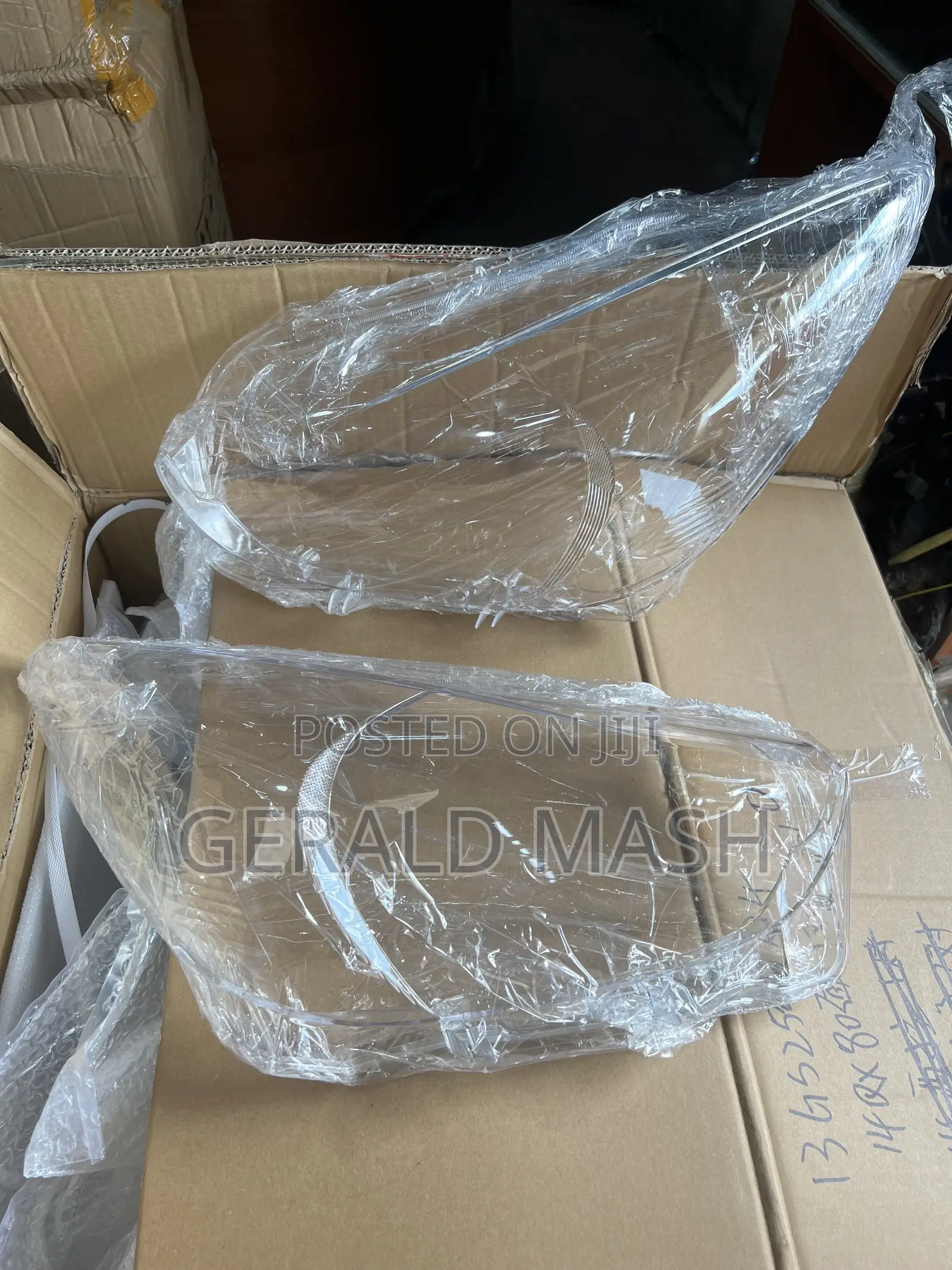 Lens Mazda Demio