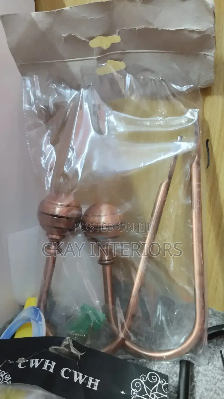 A Stylish Solution for Perfectly Arranged Curtains Bronze Holders
