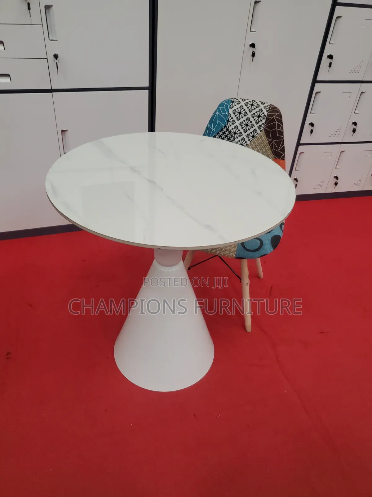 Round Trumpet Base Table and Patchwork Eames Chair