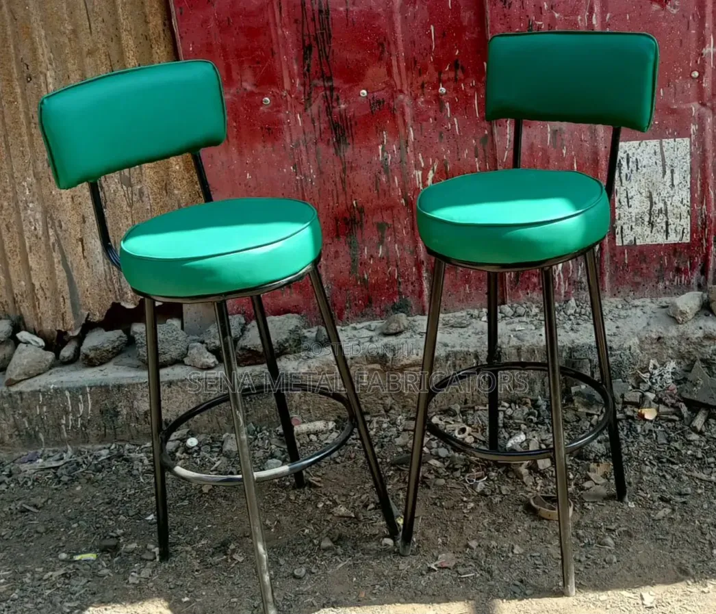 Kitchen Counter Stools With Green Faux Leather.
