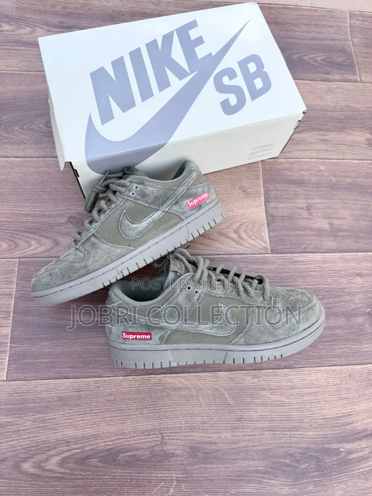 Nike SB Dunk Low X Supreme in an Olive Sneakers