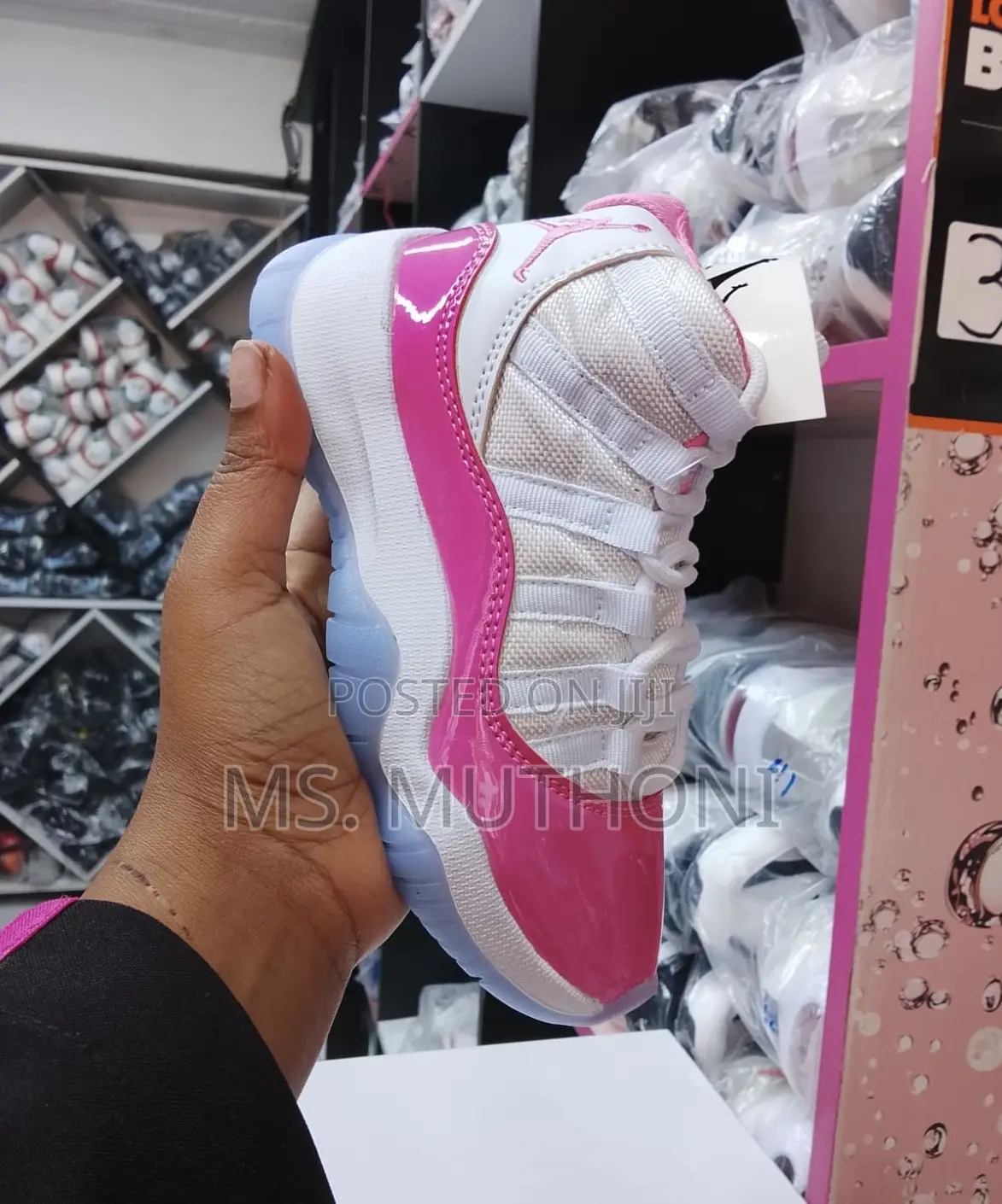 Assortment of Air Jordan 11 Retro Basketball Kids Sneakers (25-30)