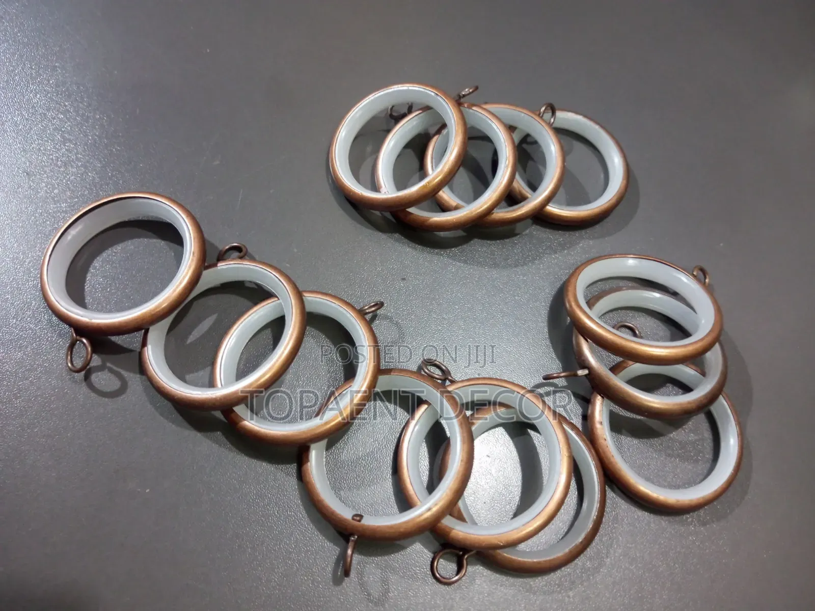 Bronze Round Rings With a Plastic Band