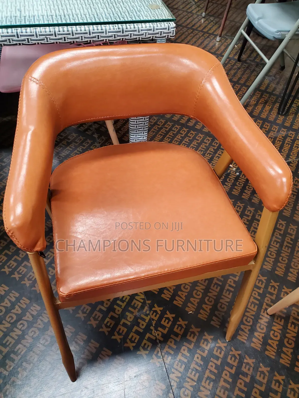 Curved Cognac Leather Accent Chair