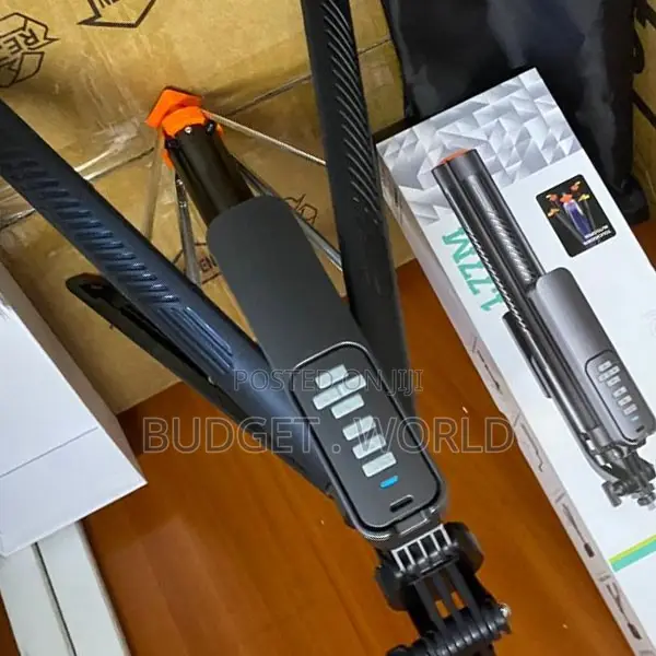 . T05 Adjustable 360° Selfie Stick With Tripod Stand