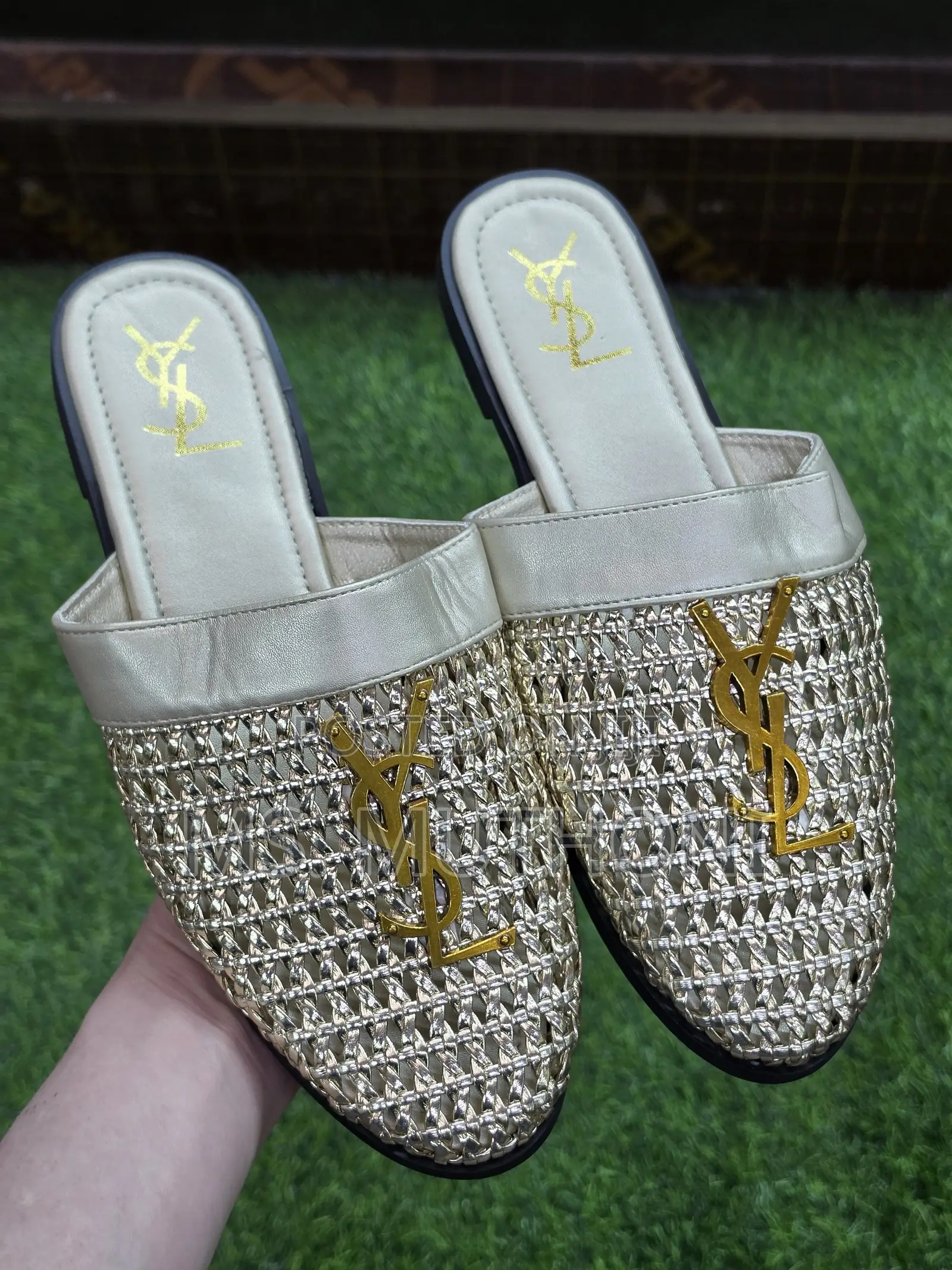 Stylish Woven YSL-logo Flat Mules Feature an Open-Back Slip-on Design