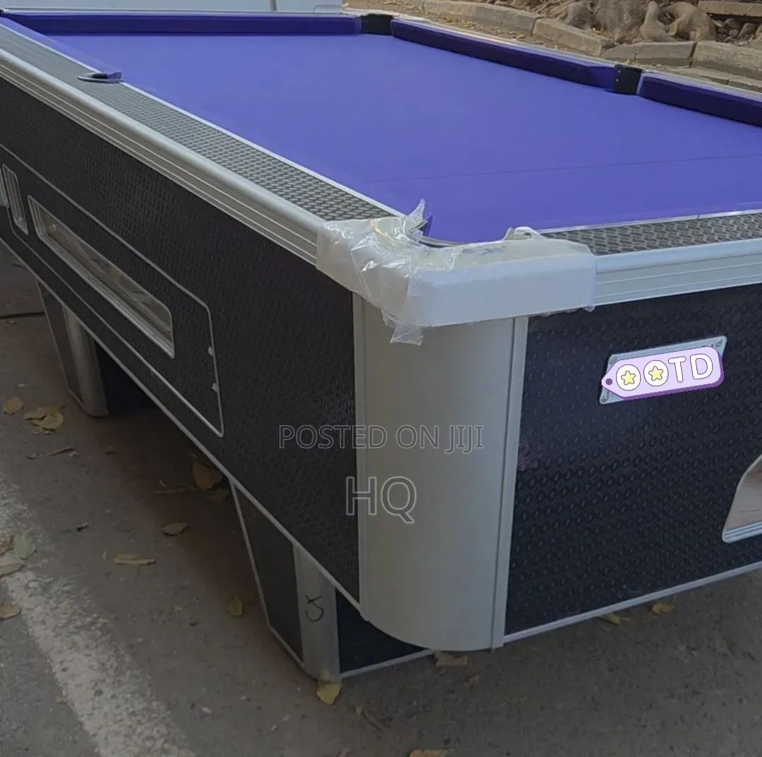 A Sports Pool Table With Amplified