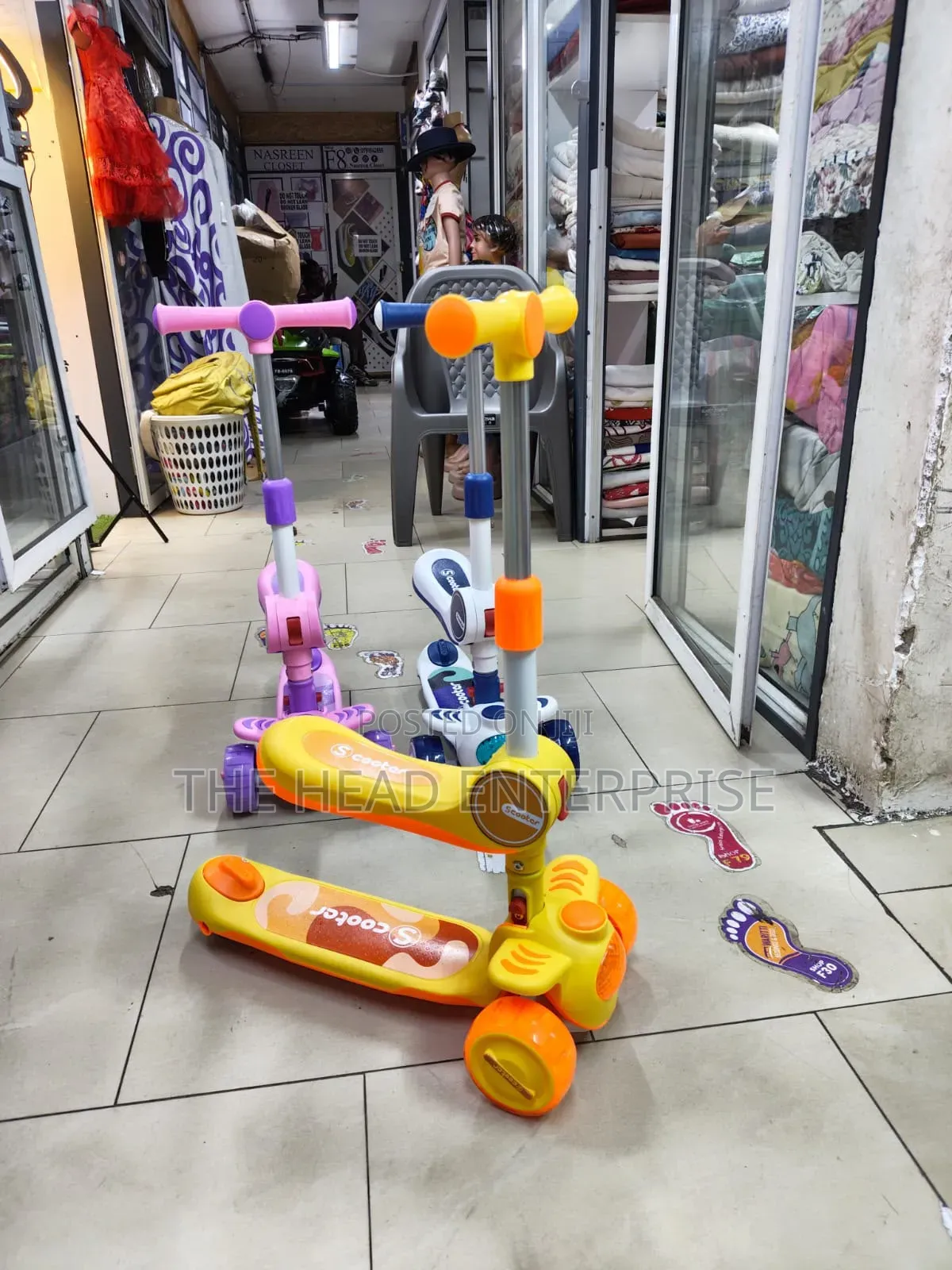 Kids Scooter With a Seat and Flickering Lights on Wheels