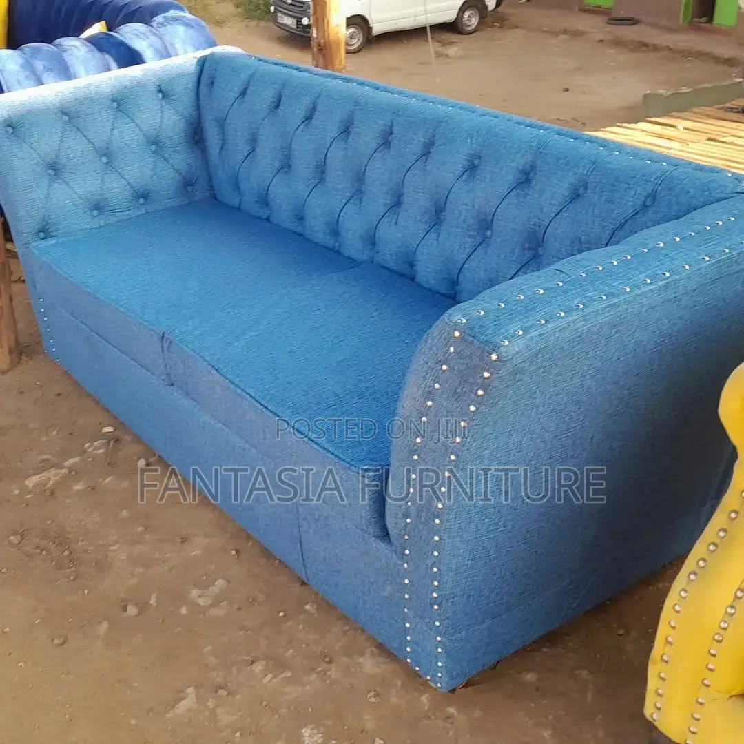 Blue Tufted 2-Seater Sofa