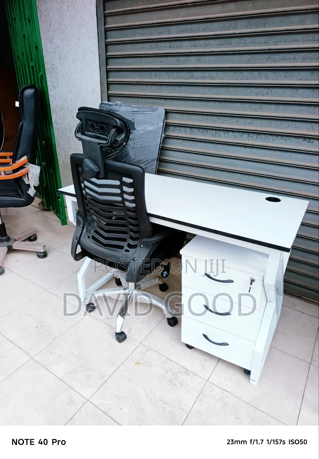 Black Mesh Office Chair and Office Table