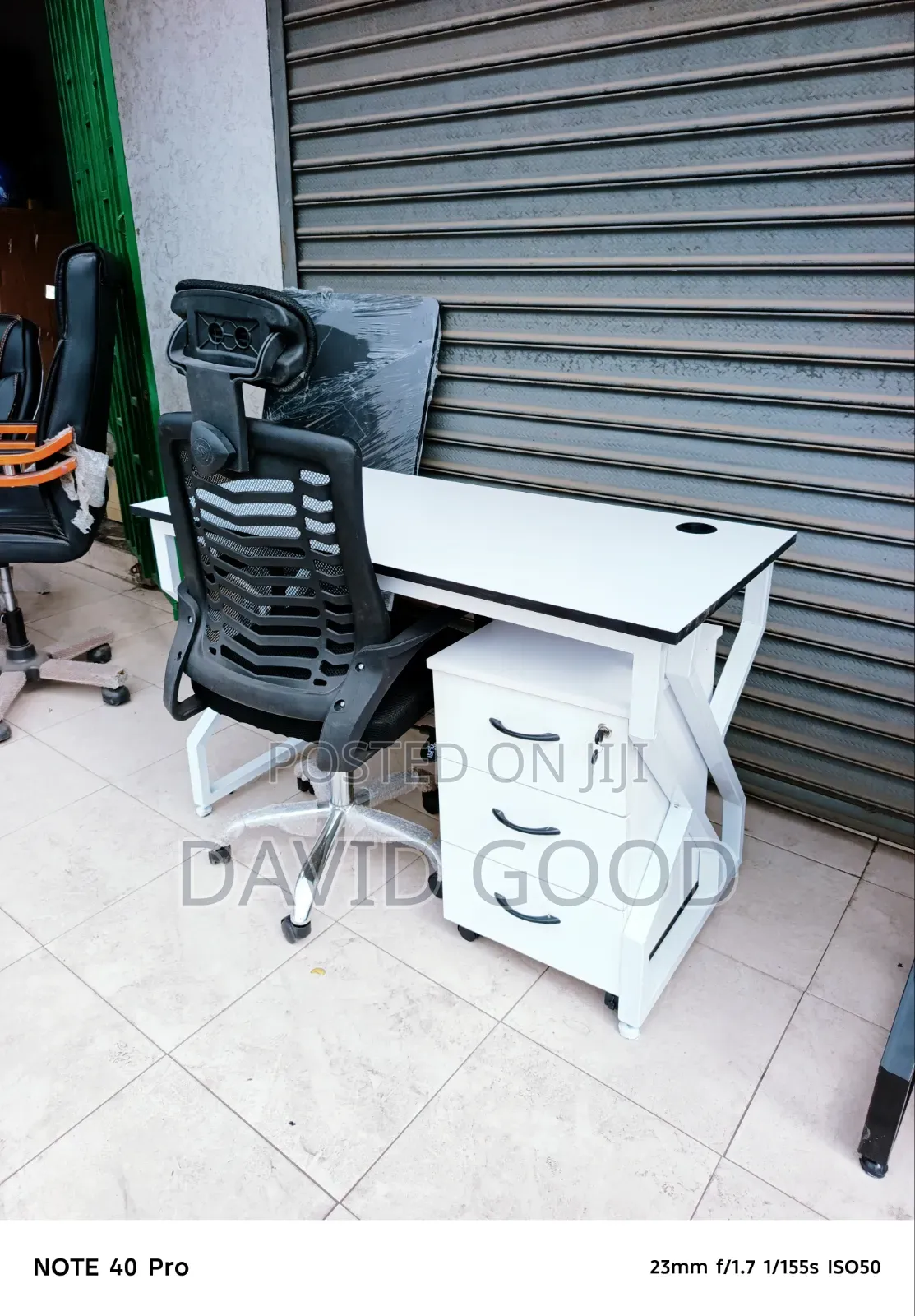 Black Mesh Office Chair and Office Table