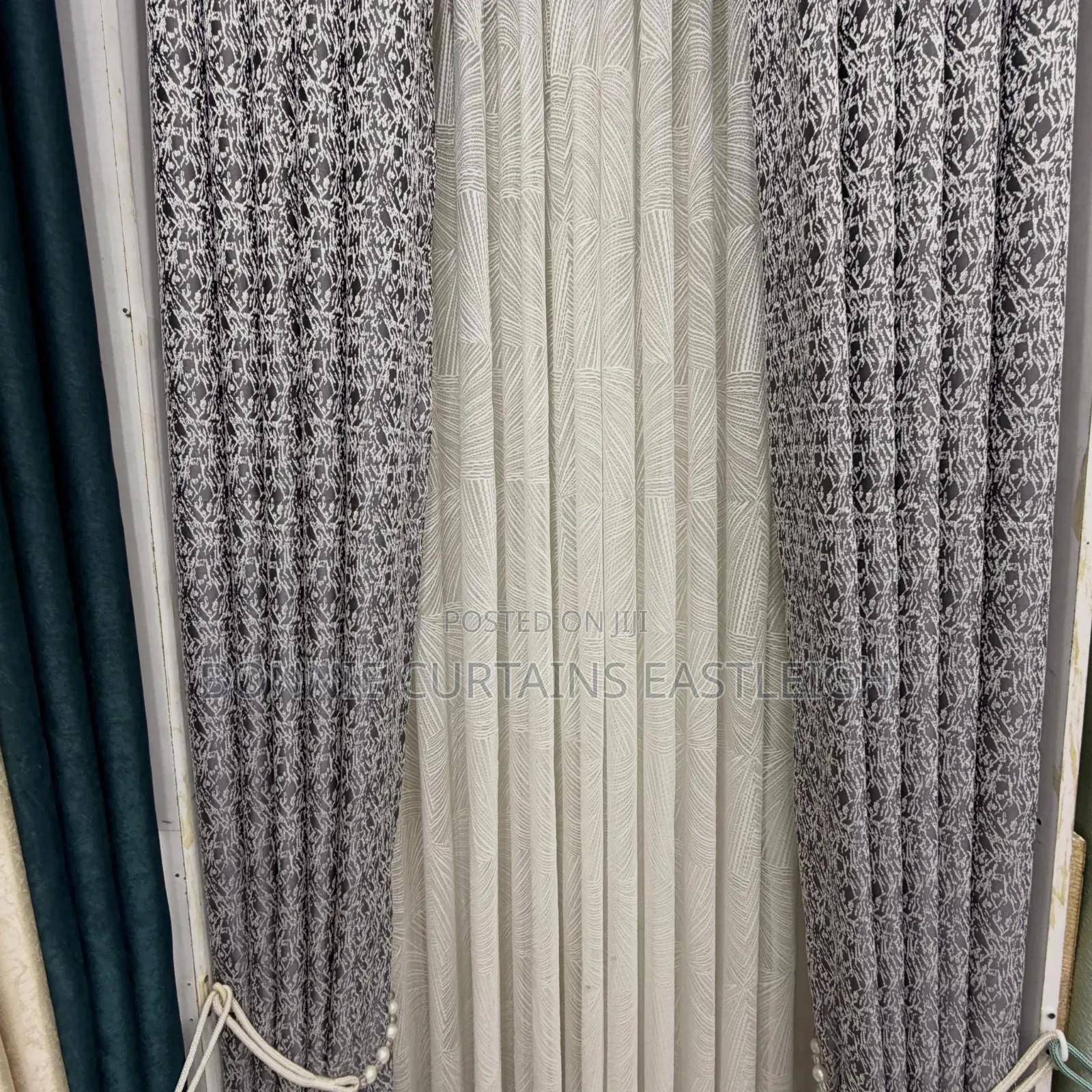 Grey Curtains and Cream Sheers With Rings