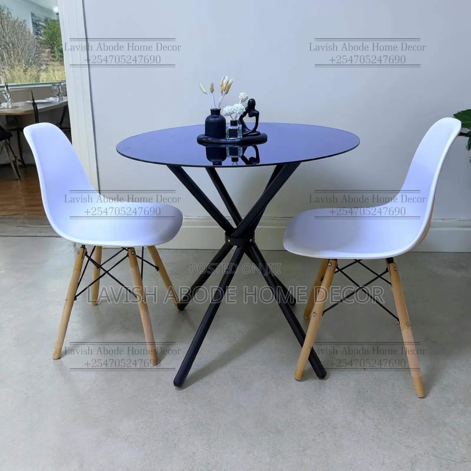 Round Black Tempered Glass Table Set With 2 White Eames Chairs