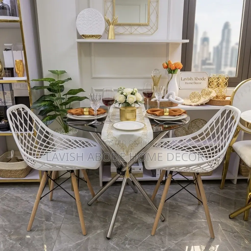 Round Clear Tempered Glass Silver Table With 2 White Mesh Eames Chair