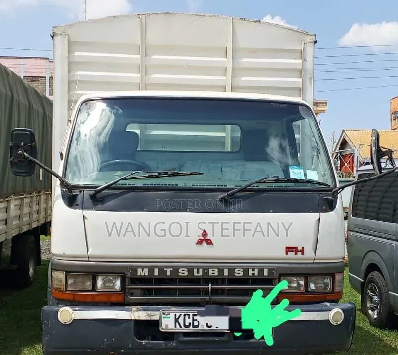 Mitsubishi FH Local 2014