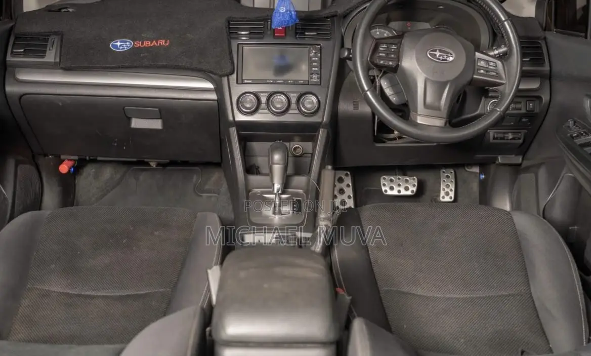 Subaru Impreza 2.0i Limited PZEV 4dr Hatchback AWD (2.0L 4cyl CVT) 2014