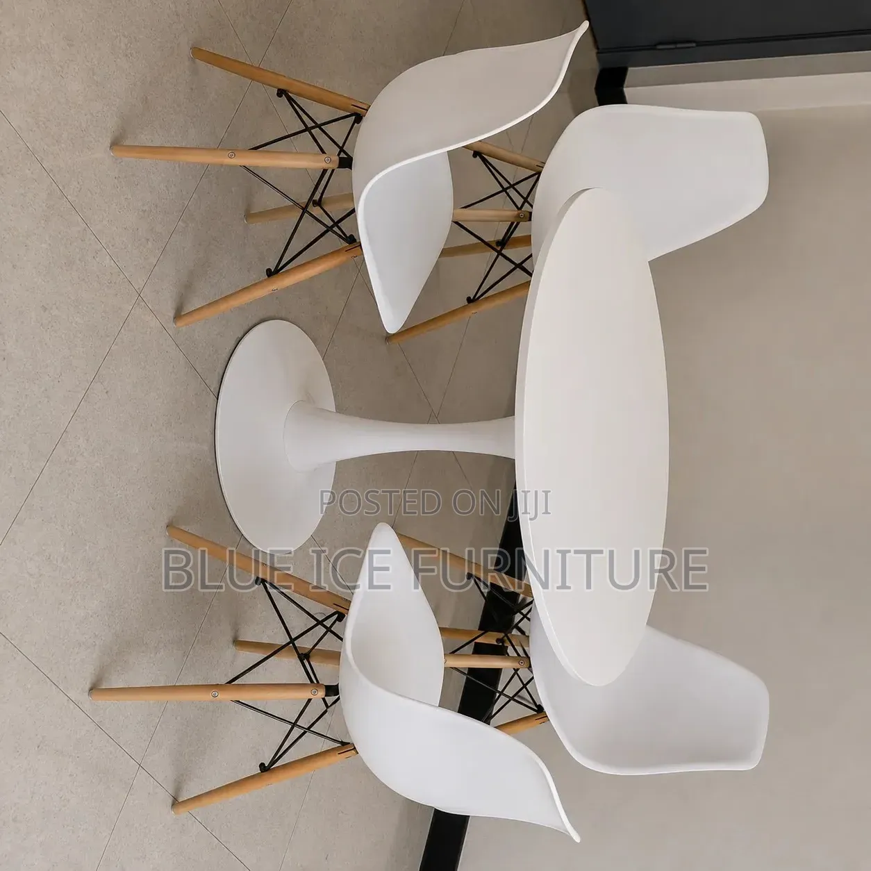 4-Seater Round Dining Table Set With Modern White Chairs