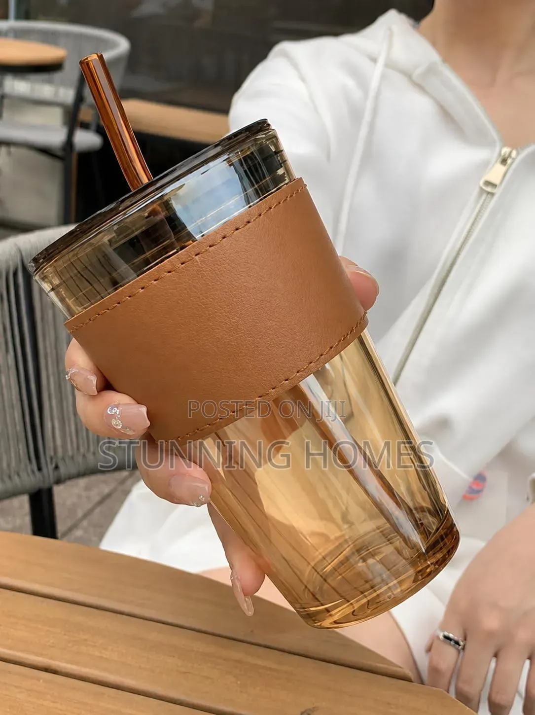 Glass Tumbler With a Sleeve and Straw