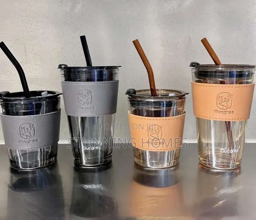 Glass Tumbler With a Sleeve and Straw