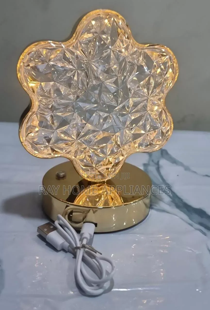 Rechargeable Flower Shaped Crystal Table Lamp Features a Gold Colored
