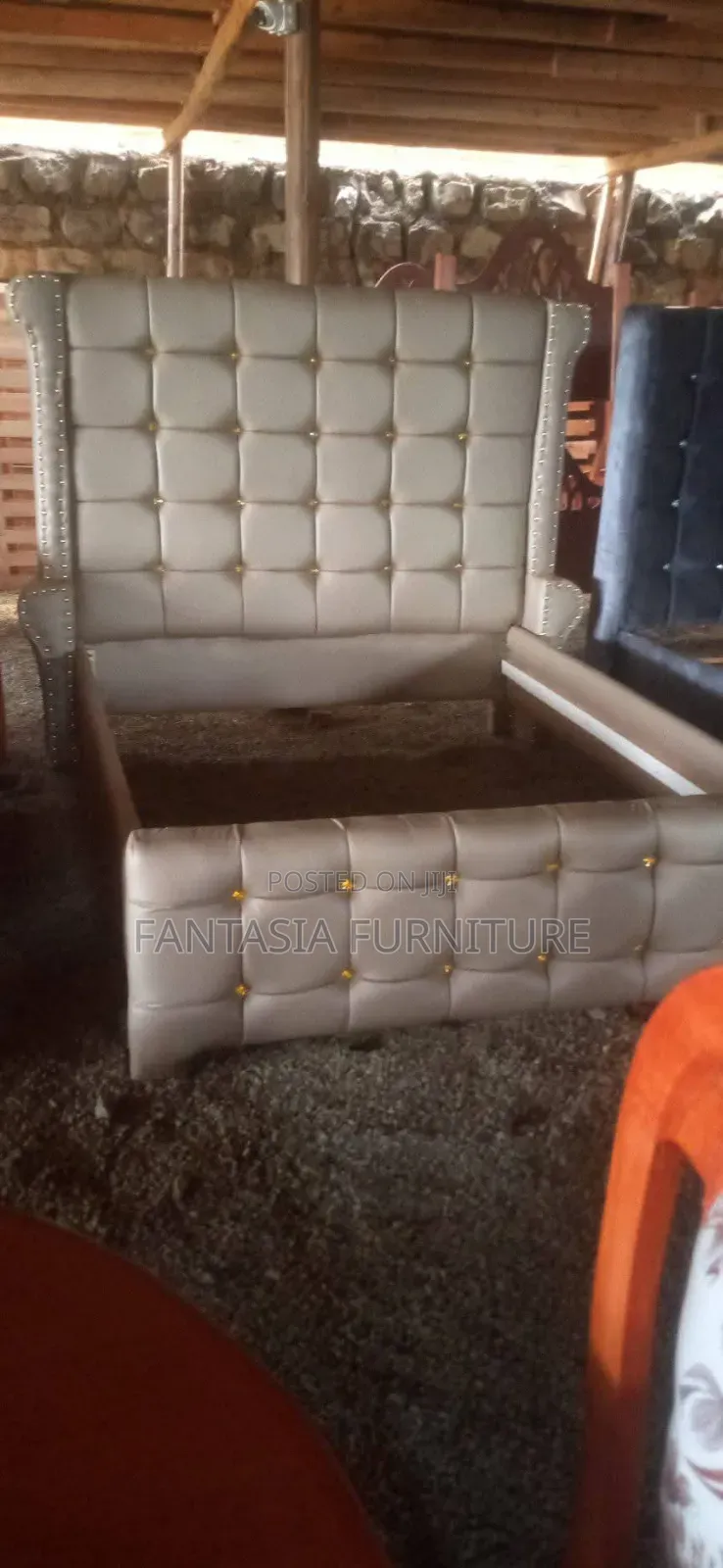 Beige Tufted 5 by 6 Bed.