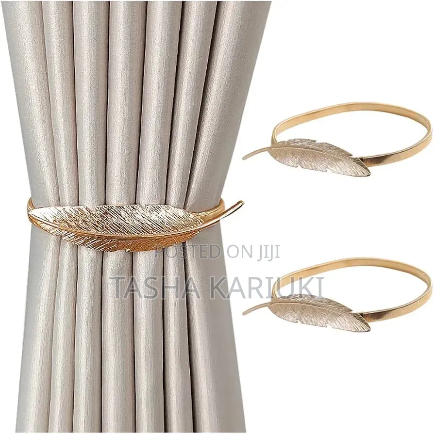 A Pair of Feather Shaped Elastic, Metallic Curtain Buckles @Gale