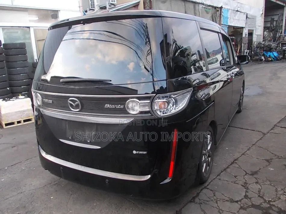 R Bumper Assy Mazda Biante 2011