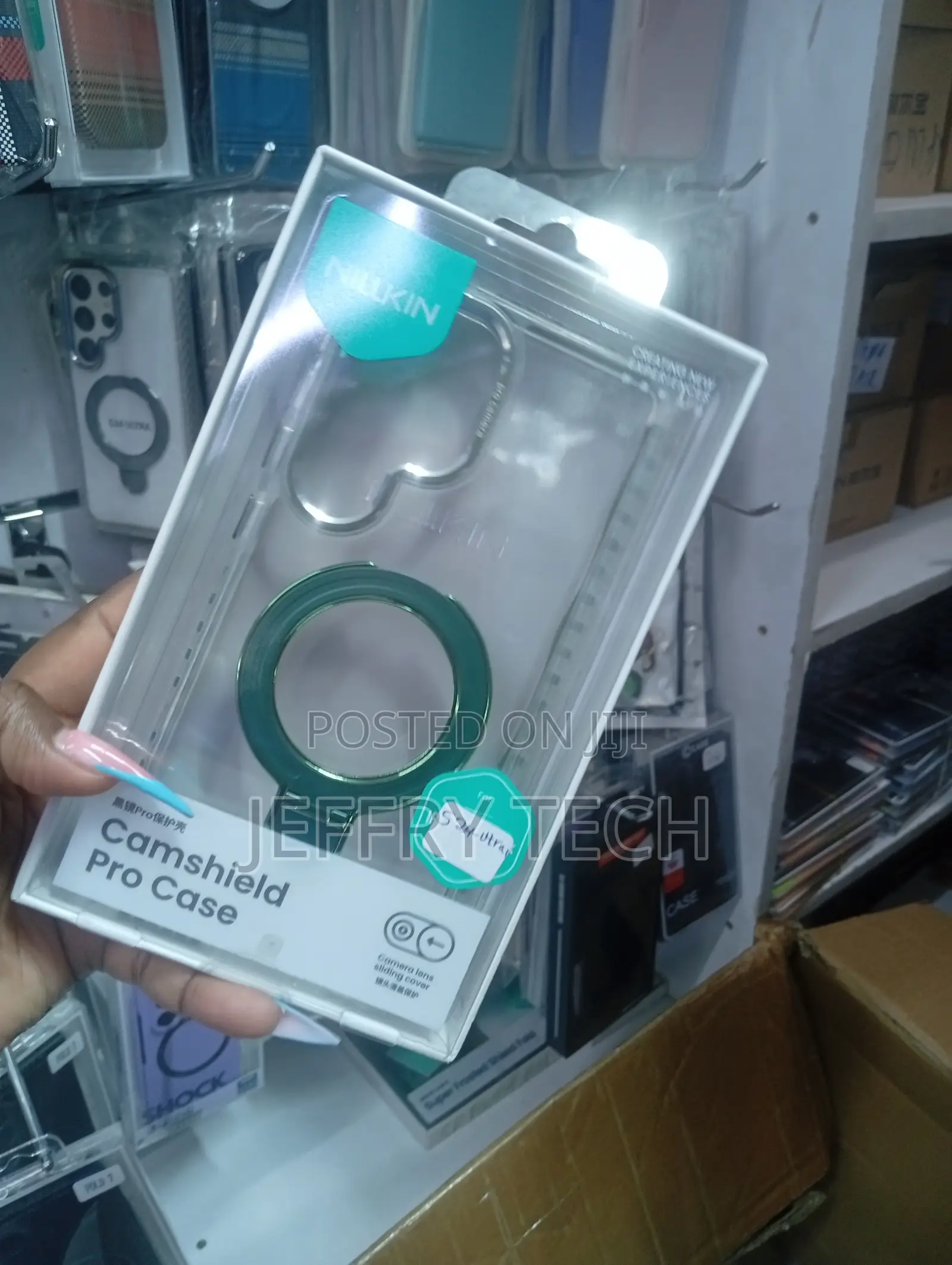 Green Nillkin CamShield Pro Case in a Retail Box With a Camera Lens