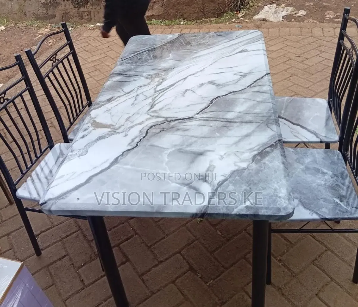 Executive 4 Sitter Dinning Table With Marble Finishing
