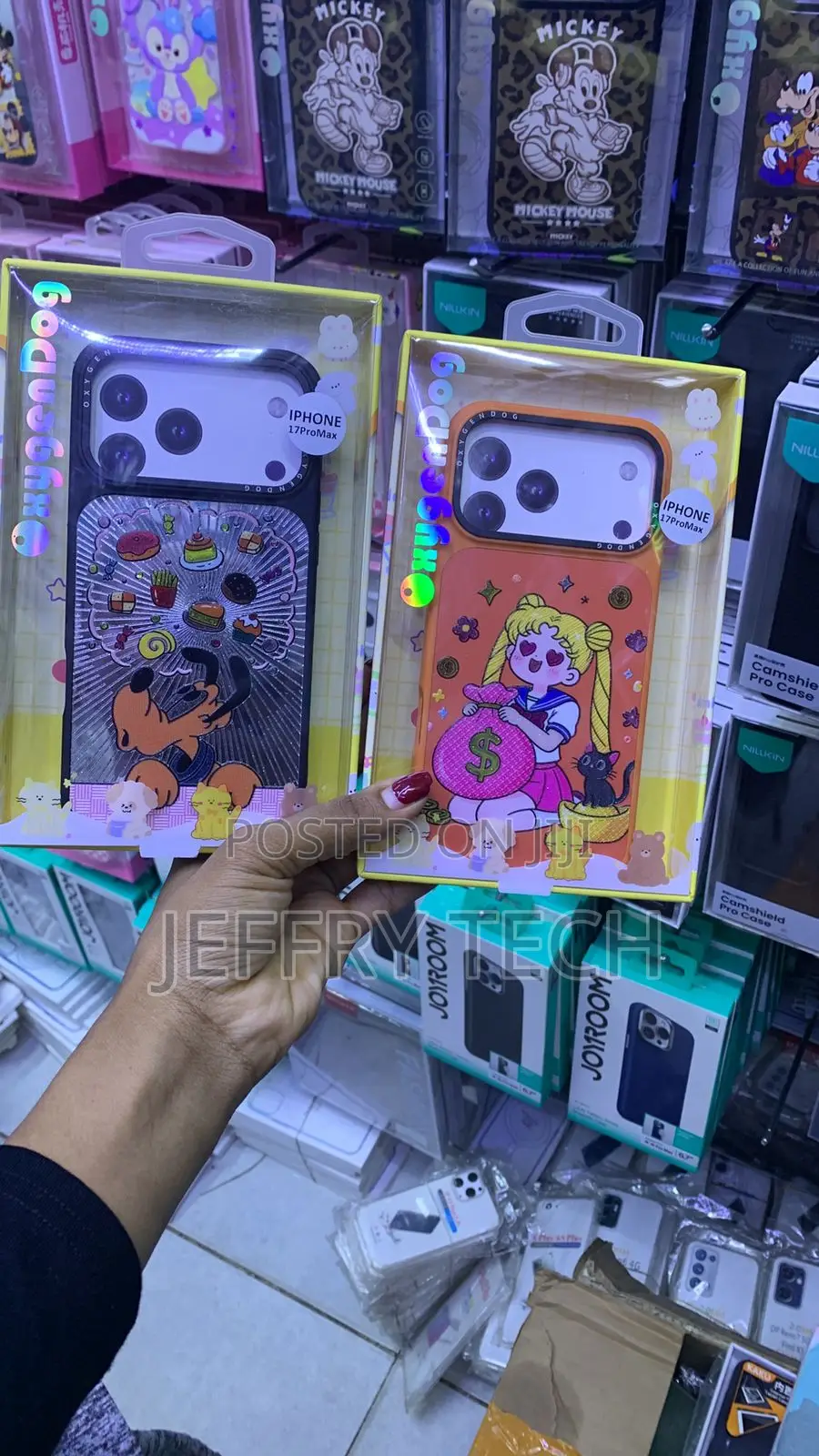 Orange Phone Case and a Black Phone Case for the iPhone 17 Pro Max.