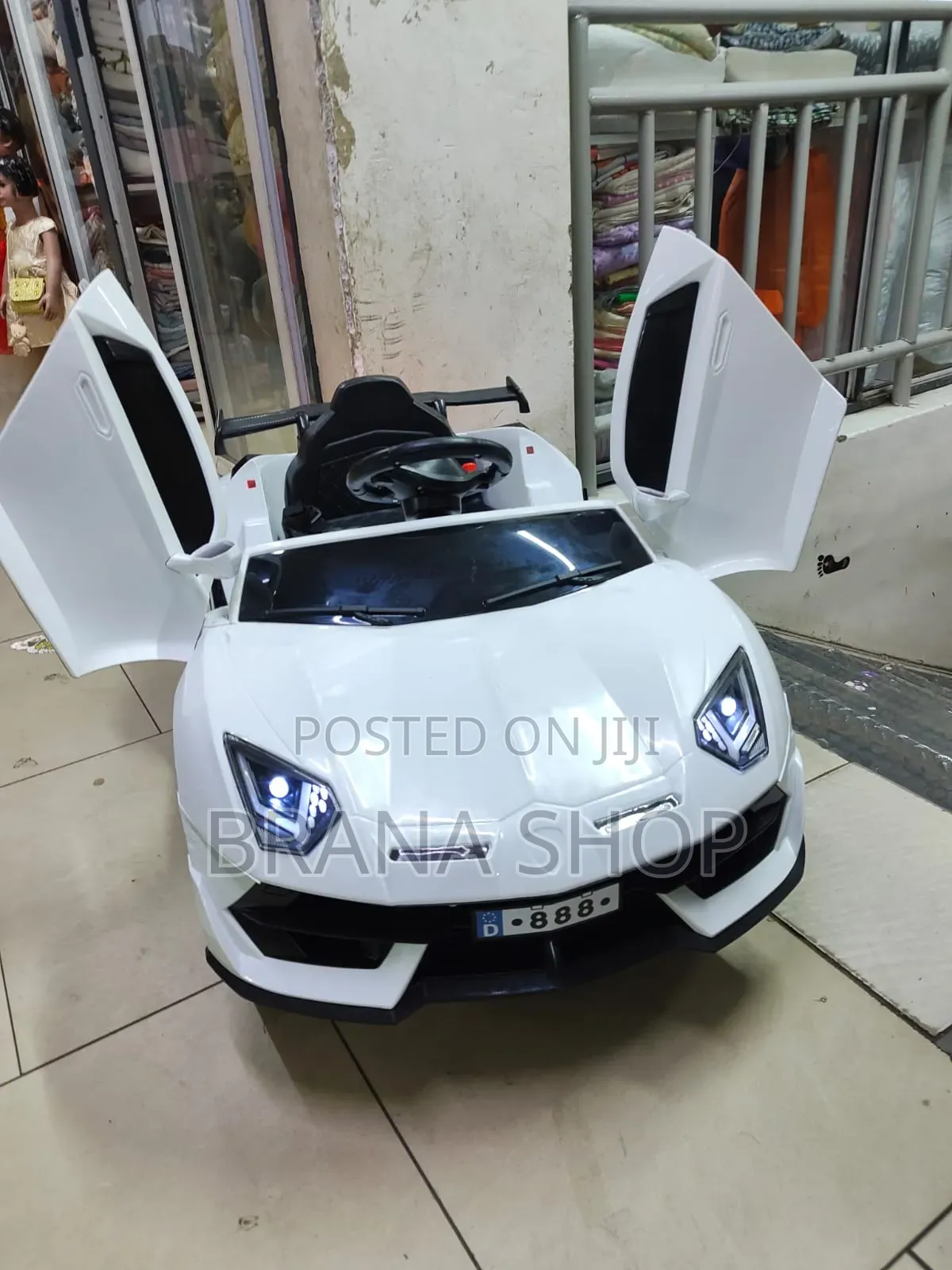 Kids Mini Ride on Toy Car With Bluetooth Speaker.