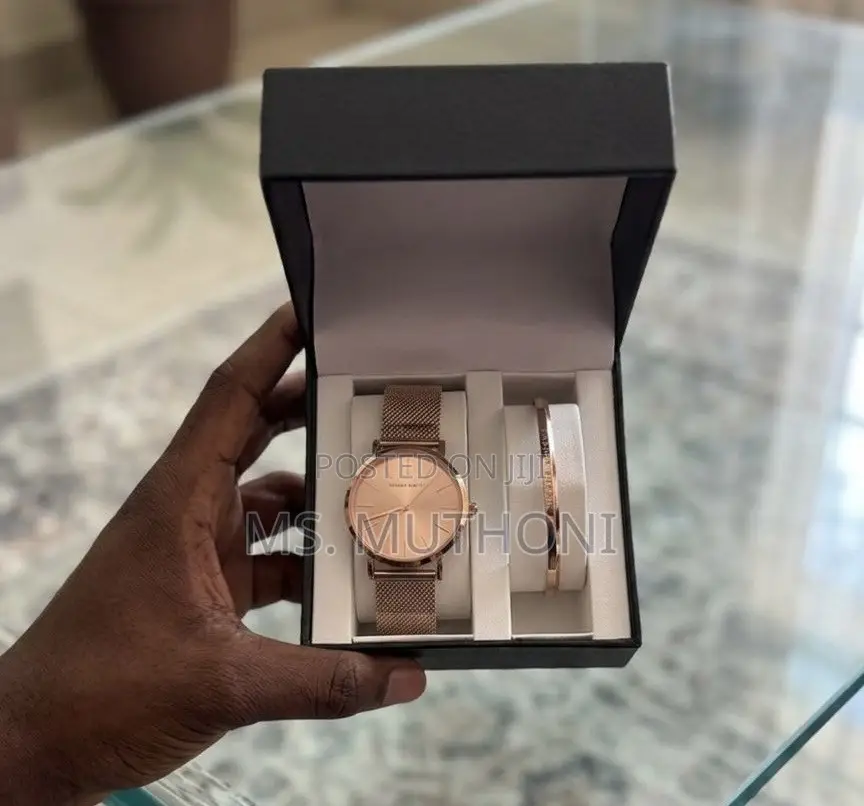  Ladies Watch X Bracelet Set Plus a Complemetary Card Gift Bag