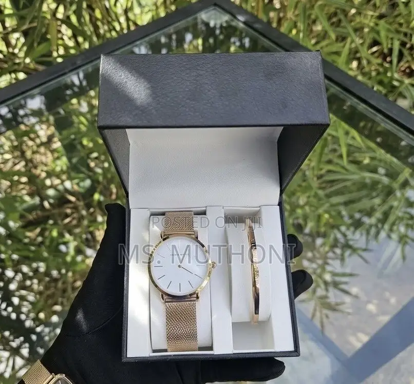  Ladies Watch X Bracelet Set Plus a Complemetary Card Gift Bag