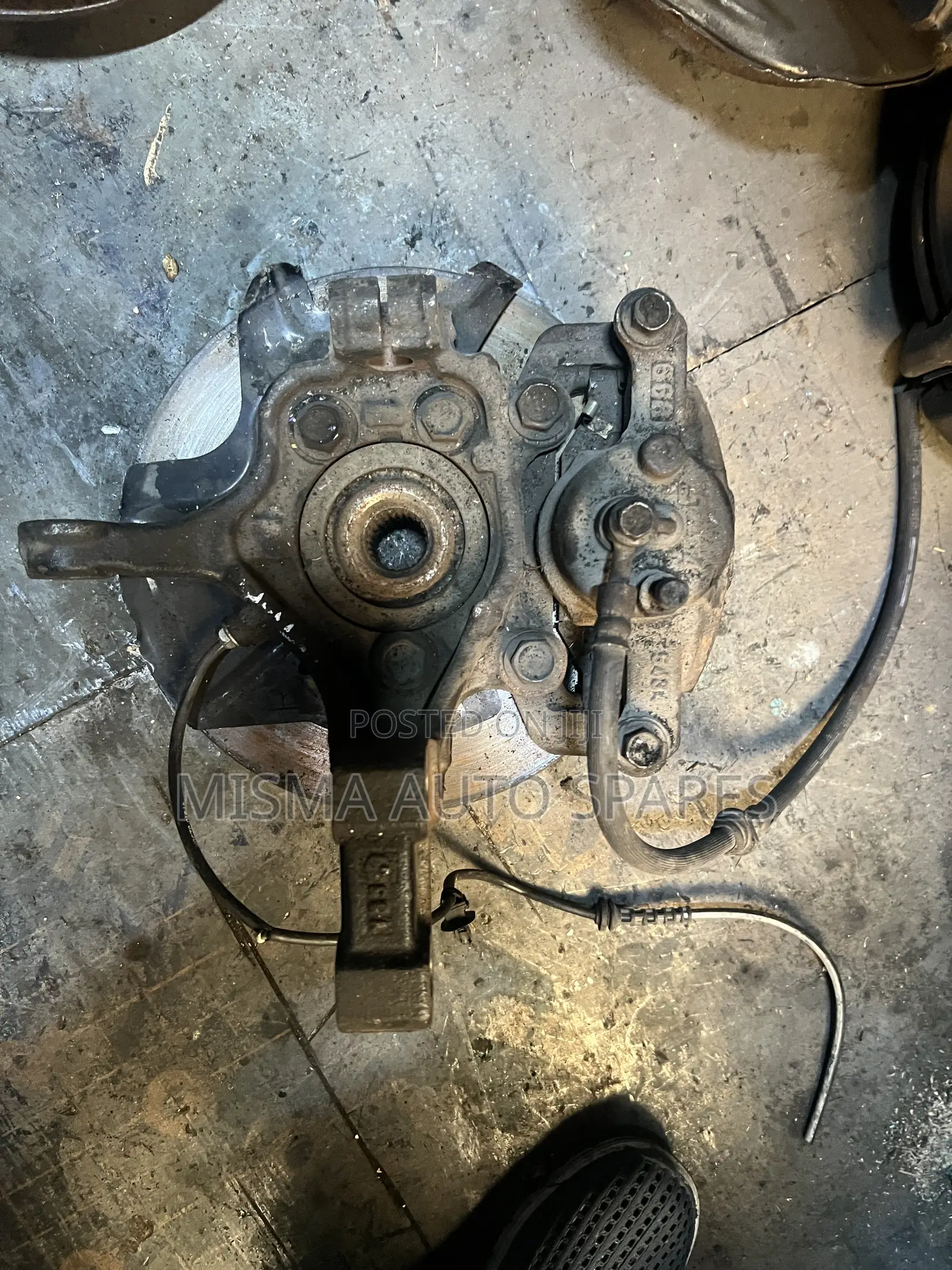 Tiida Calliper/Hub/Disc