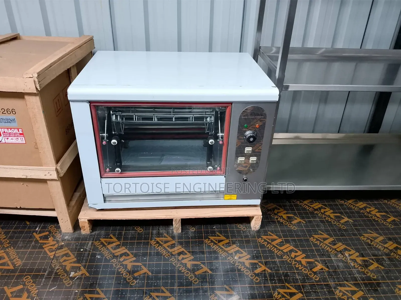 Electric Chicken Roaster Which Contains 12 Birds