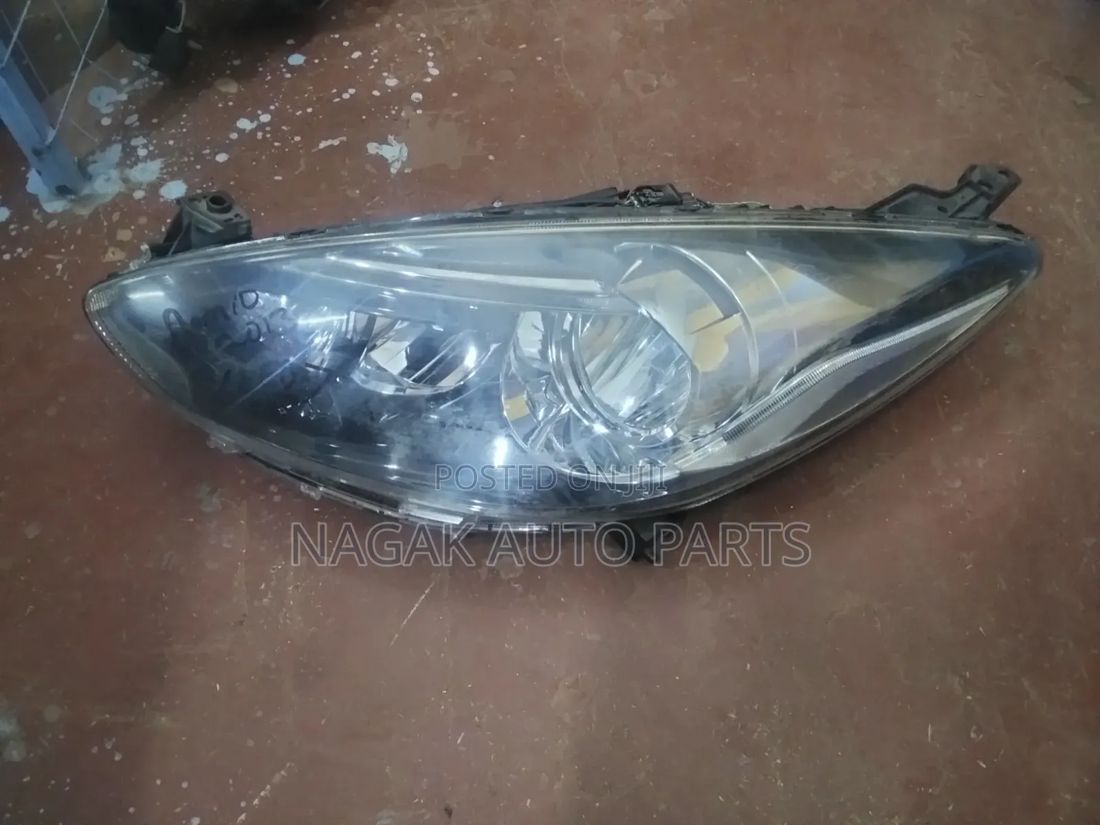 Demio 2012 Headlight Xenon