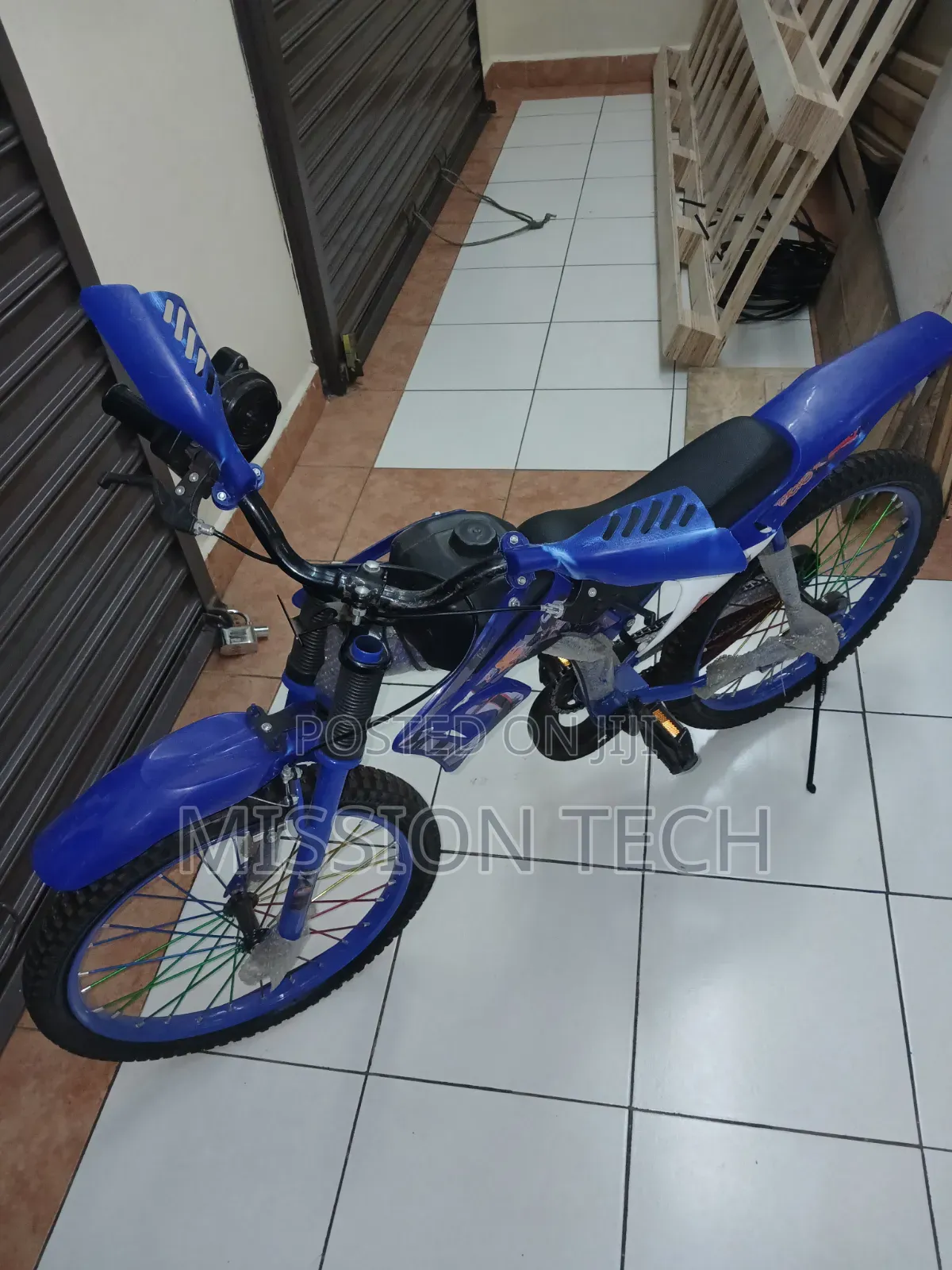 Blue Premier Racing Bike, a Motocross-Style Children's Bicycle.