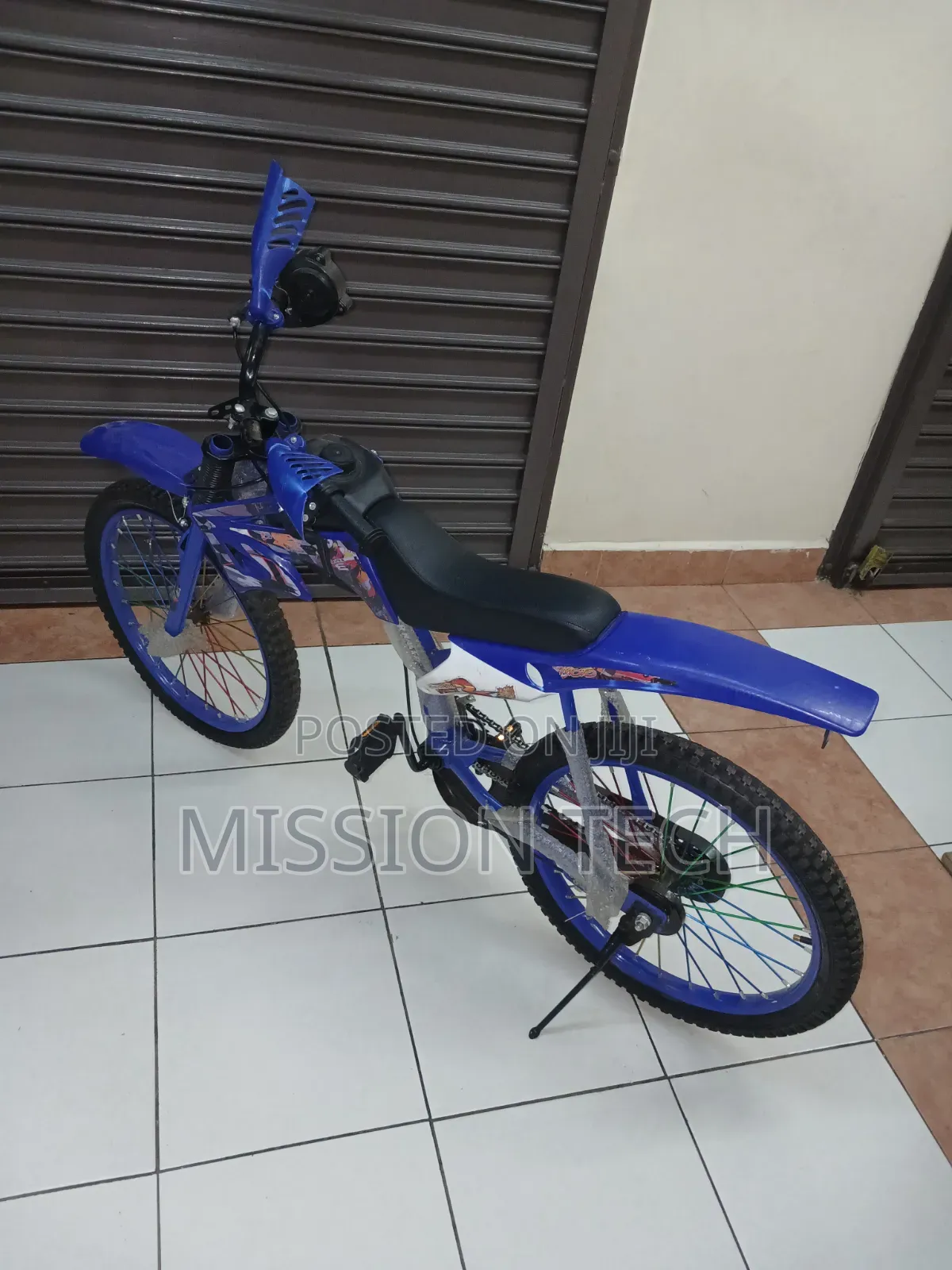 Blue Premier Racing Bike, a Motocross-Style Children's bicycle.Size 20