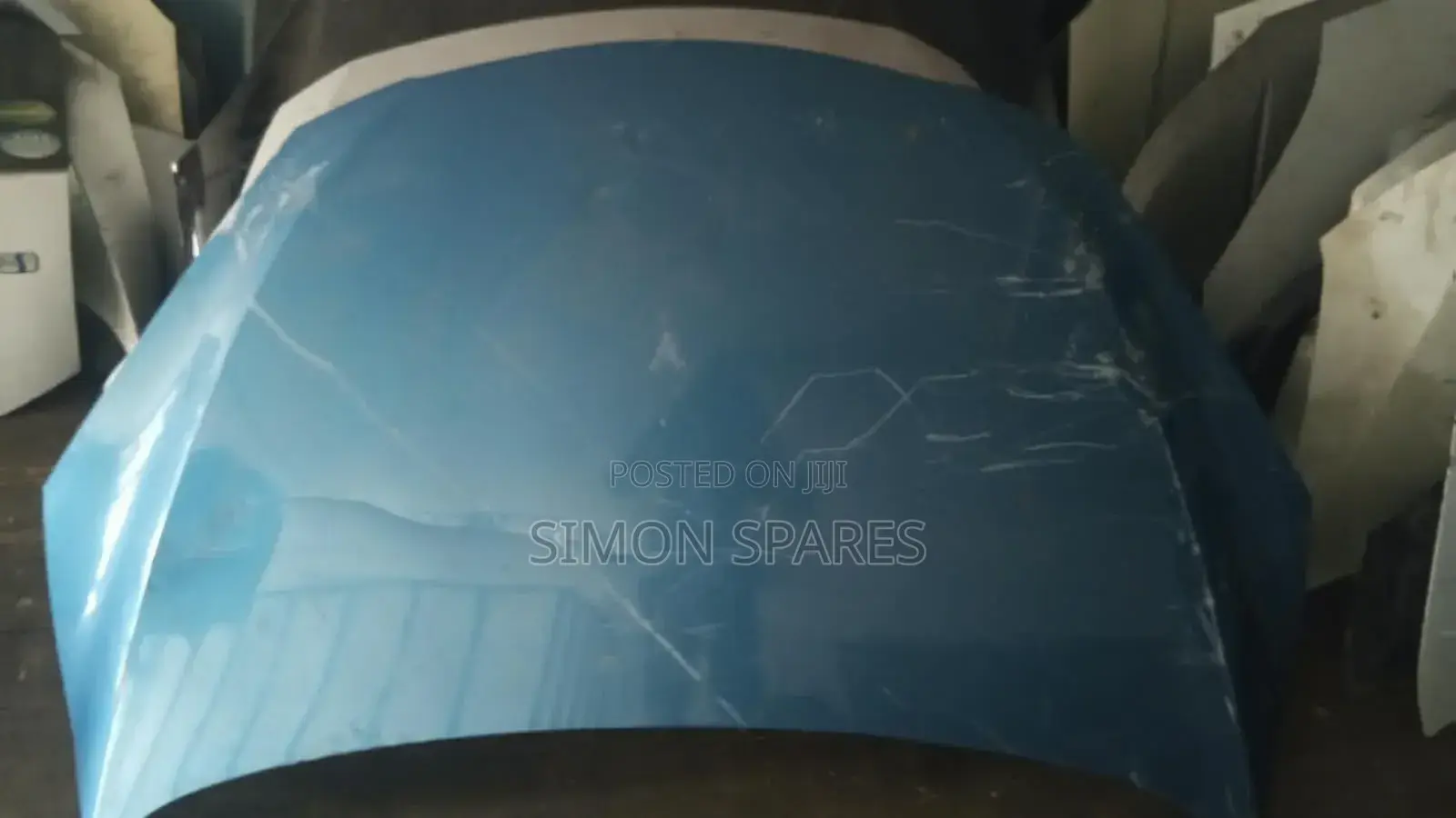 Mazda Demio DE Bonnet