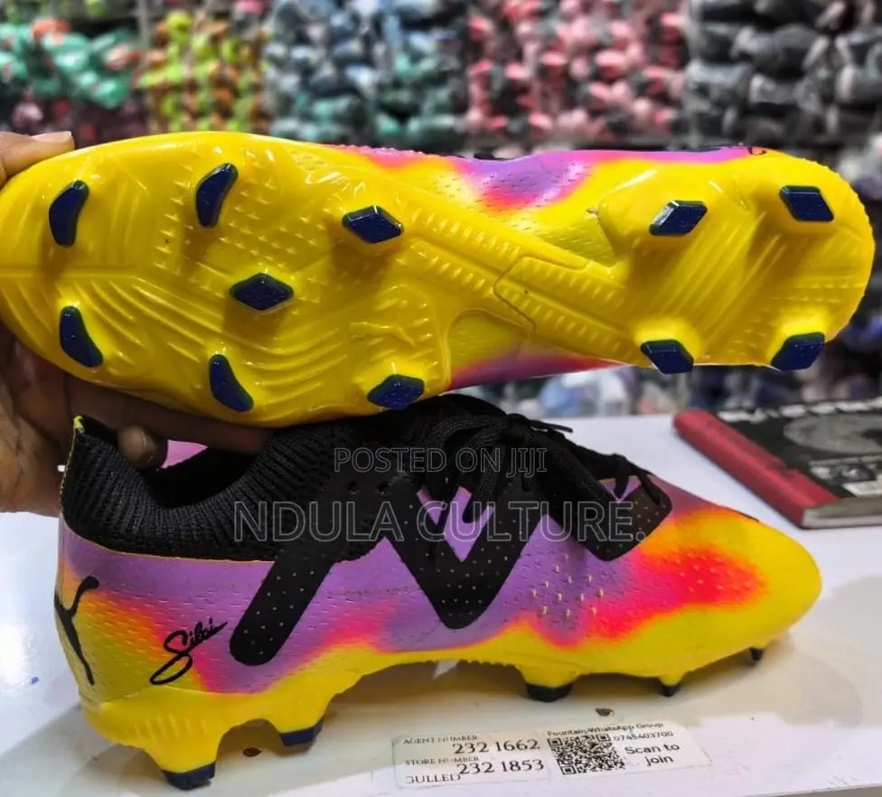 Vibrant Puma Future Ultimate Football Boots.