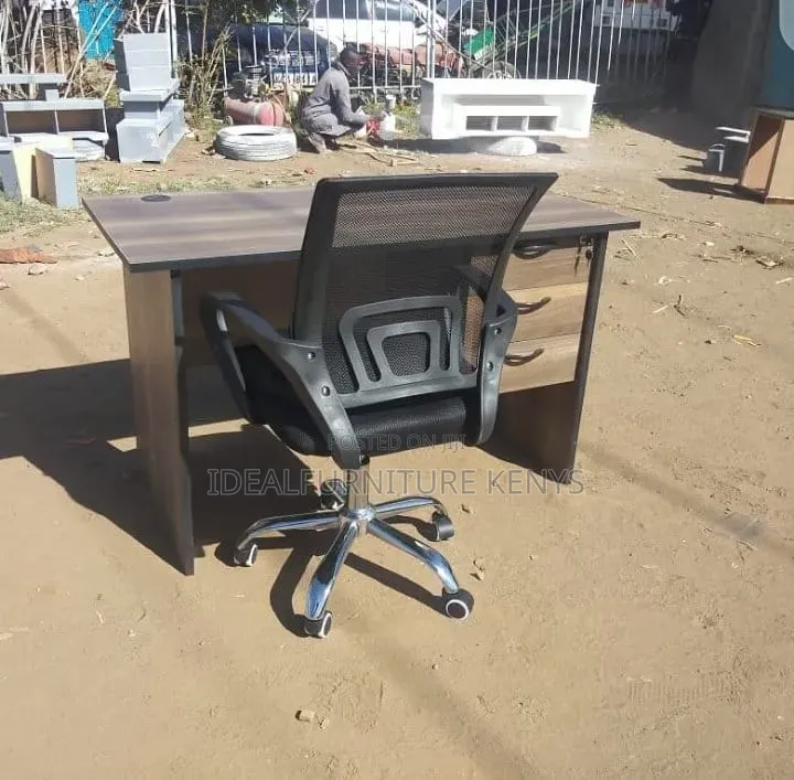 - Brown Office Table With Mesh Chair
