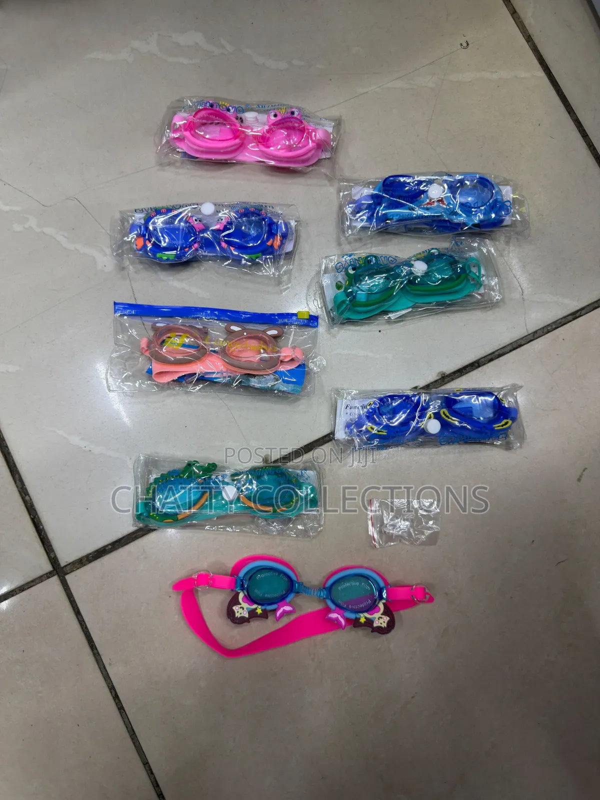 Kid Anti Fog Colorful Swimming Googles Comes With a Pair of Ear Plugs