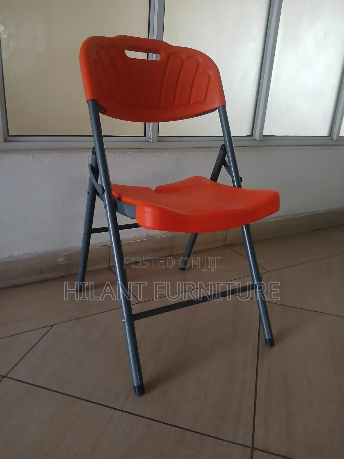 Elevate Plastic Orange Folding Chair